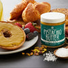 Nuttinosh sea salt pistachio butter with bagel, pistachios, and breakfast spread