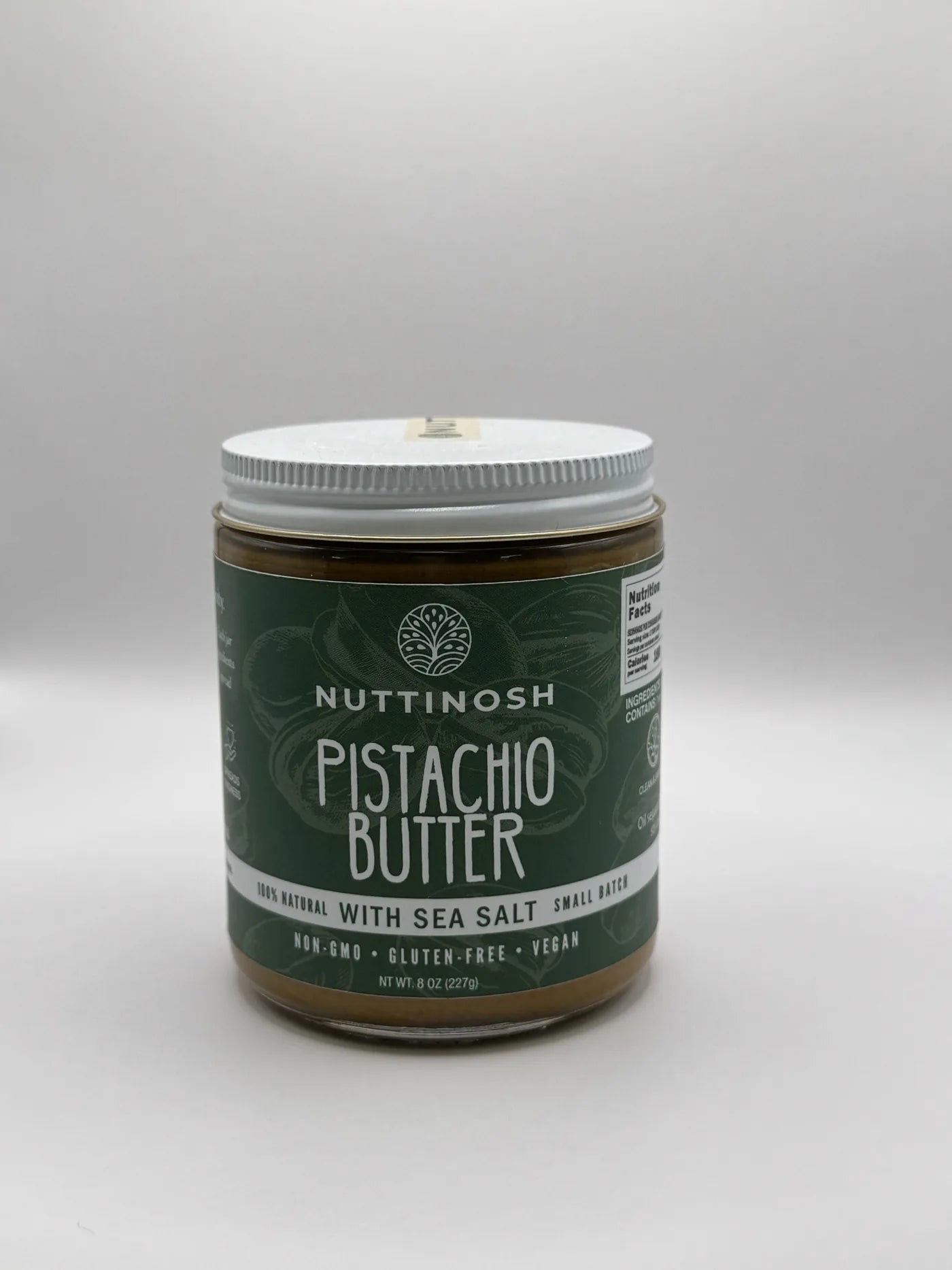 Nuttinosh sea salt pistachio butter 8 oz jar front label