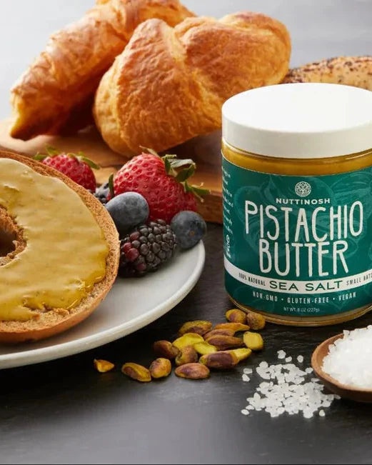 Nuttinosh Pistachio Butter with Sea Salt served with toast, fruit, and pistachios