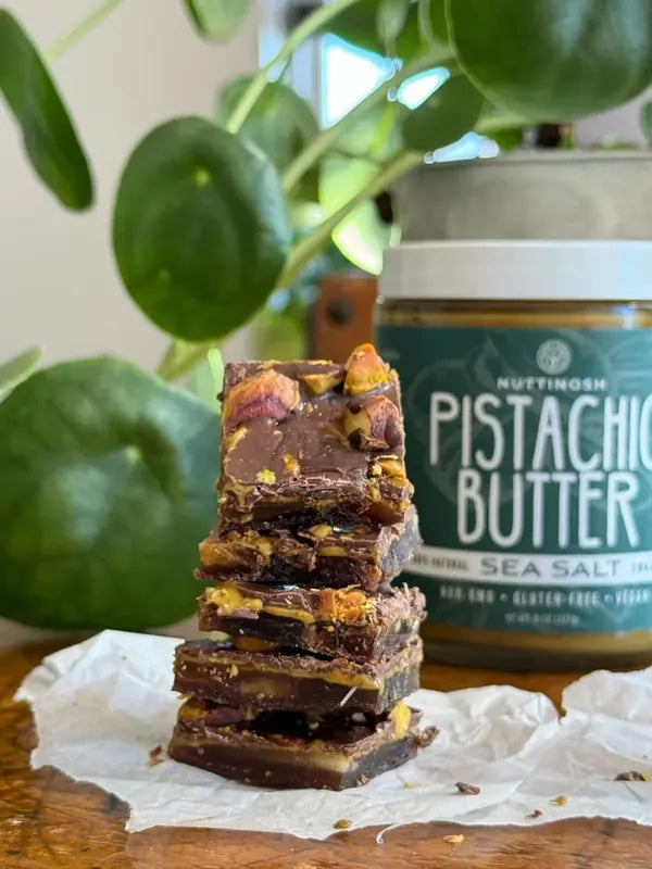 Nuttinosh pistachio butter with sea salt jar and chocolate pistachio snack bites